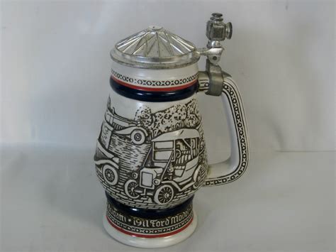 75" high with lid 2 lbs. . Avon stein
